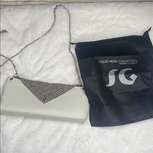 Liquid metal collection crossbody purse